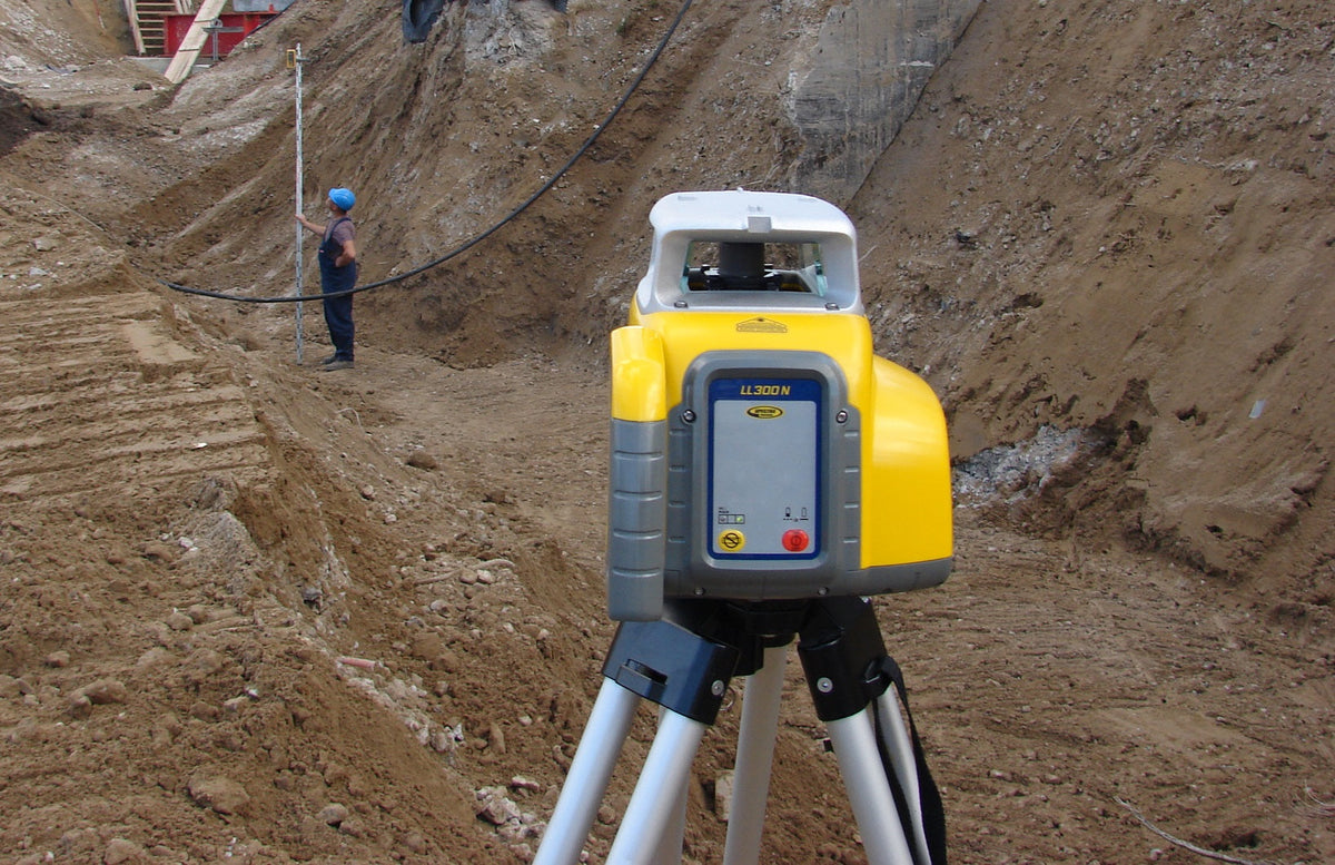 Spectra LL300N rotating laser set up on a construction site